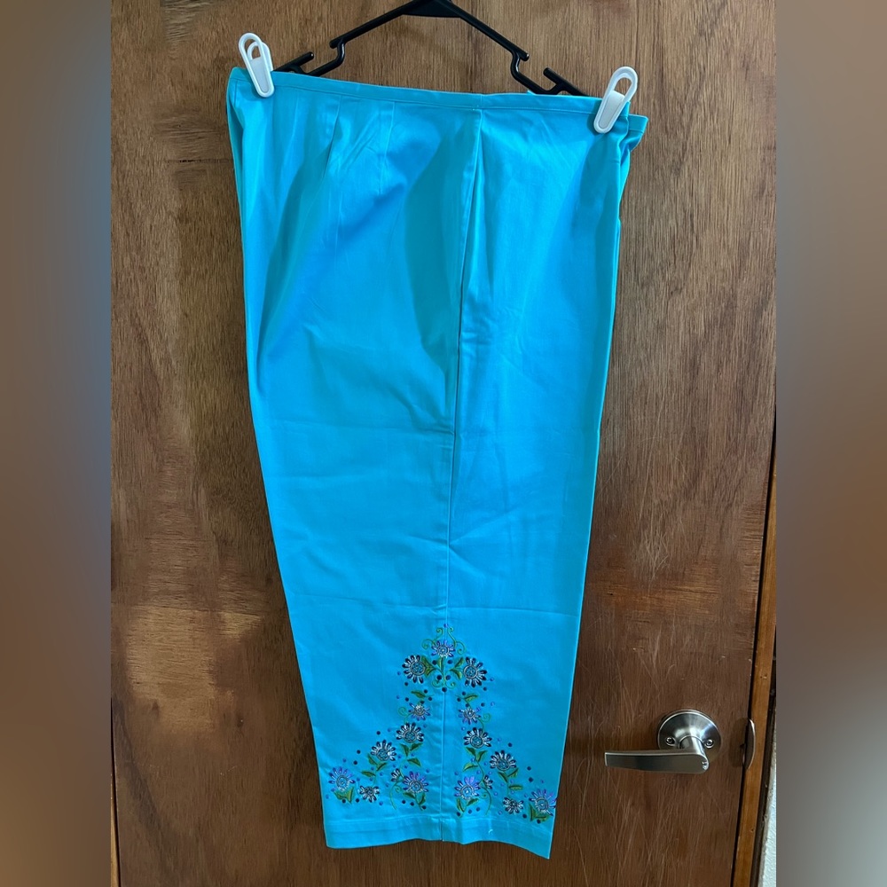 Avenue capris turquoise blue with beautiful embroidery on legs!  Size 18